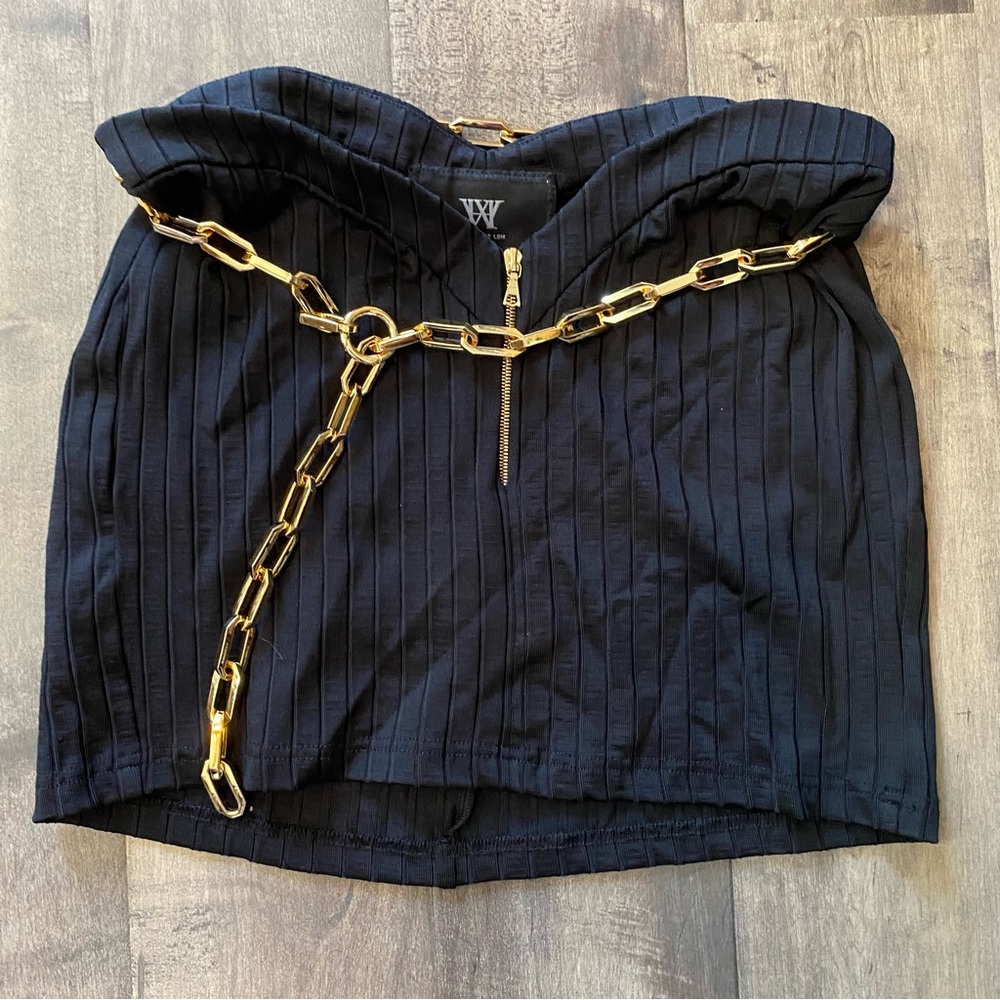 WL SKIRT  Black with Gold Chain Detail attached.